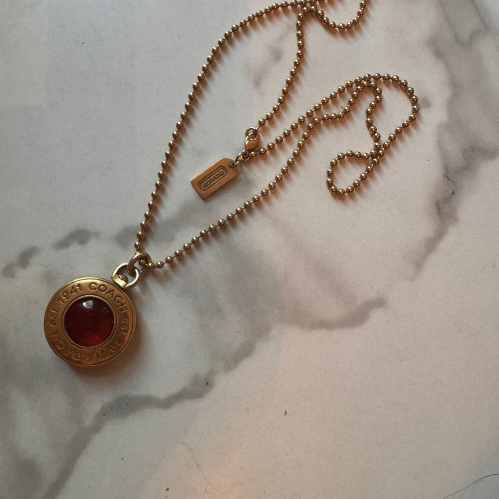 Coach Logo Pendant In Gold Tone Amber Glass Center on Gold Tone Chain - Picture 2 of 2